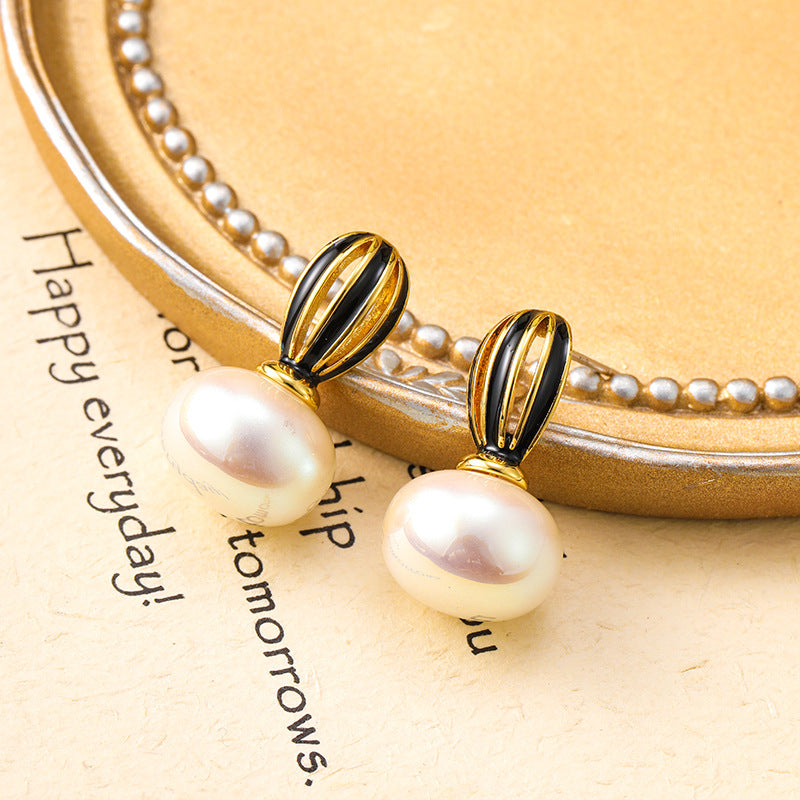 925 silver needle new hollow pumpkin oil drop pearl earrings for women, high-end niche, unique and simple women's earrings