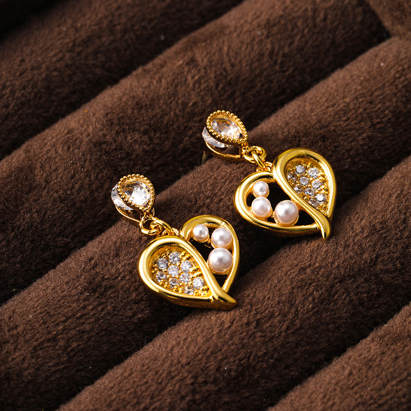 French exquisite hollow heart micro-inlaid zircon pearl earrings for women, high-end and versatile small silver needle earrings