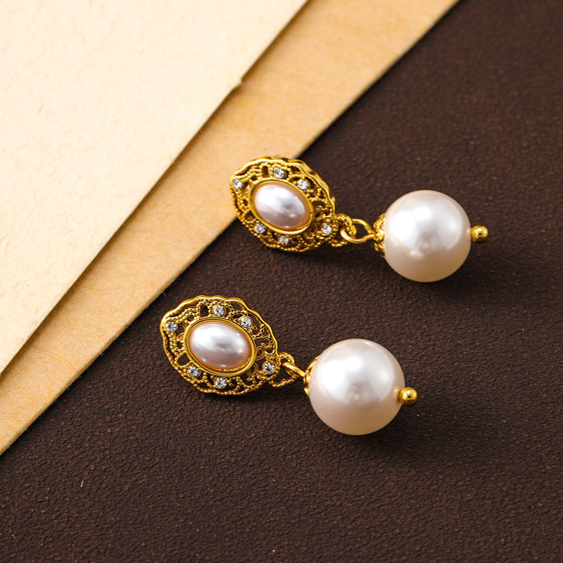 French retro palace style hollow flower plate pearl earrings niche design 925 silver needle earrings