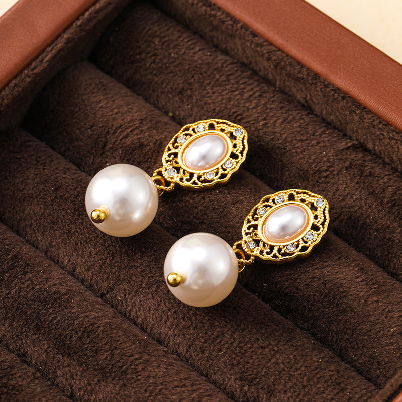 French retro palace style hollow flower plate pearl earrings niche design 925 silver needle earrings