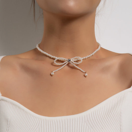 Trendy necklace full of pearls and tassels, diamond bow super fairy clavicle chain