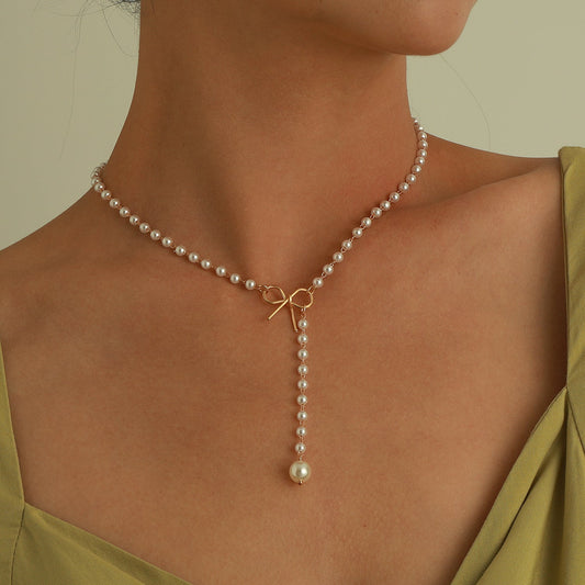 Alloy Bow Pearl Tassel Pendant Necklace