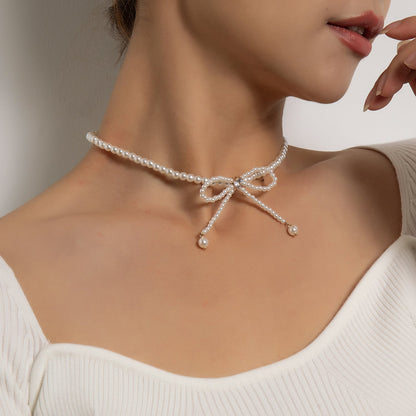 Trendy necklace full of pearls and tassels, diamond bow super fairy clavicle chain