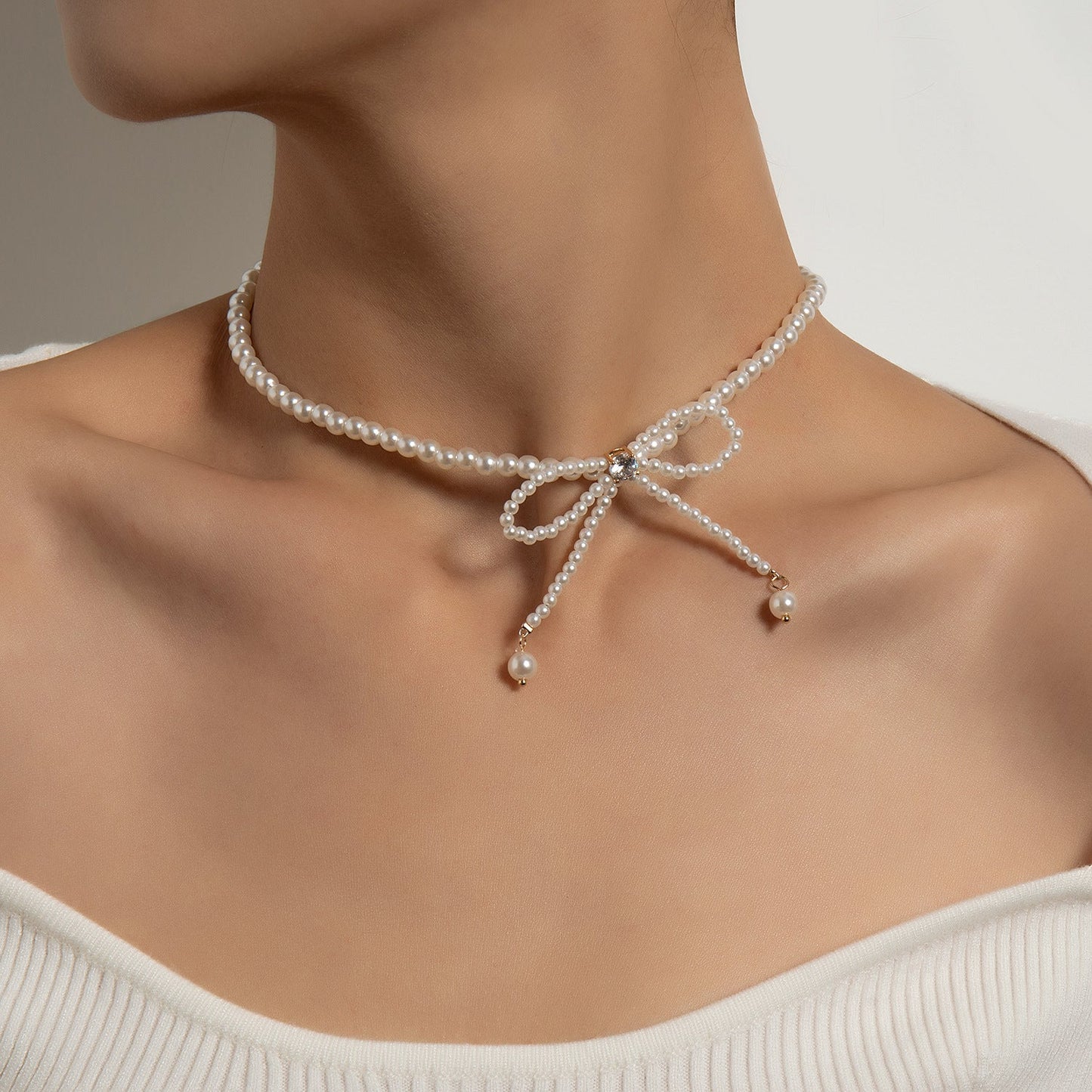 Trendy necklace full of pearls and tassels, diamond bow super fairy clavicle chain