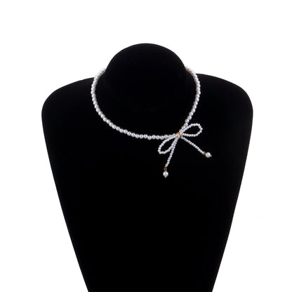 Trendy necklace full of pearls and tassels, diamond bow super fairy clavicle chain