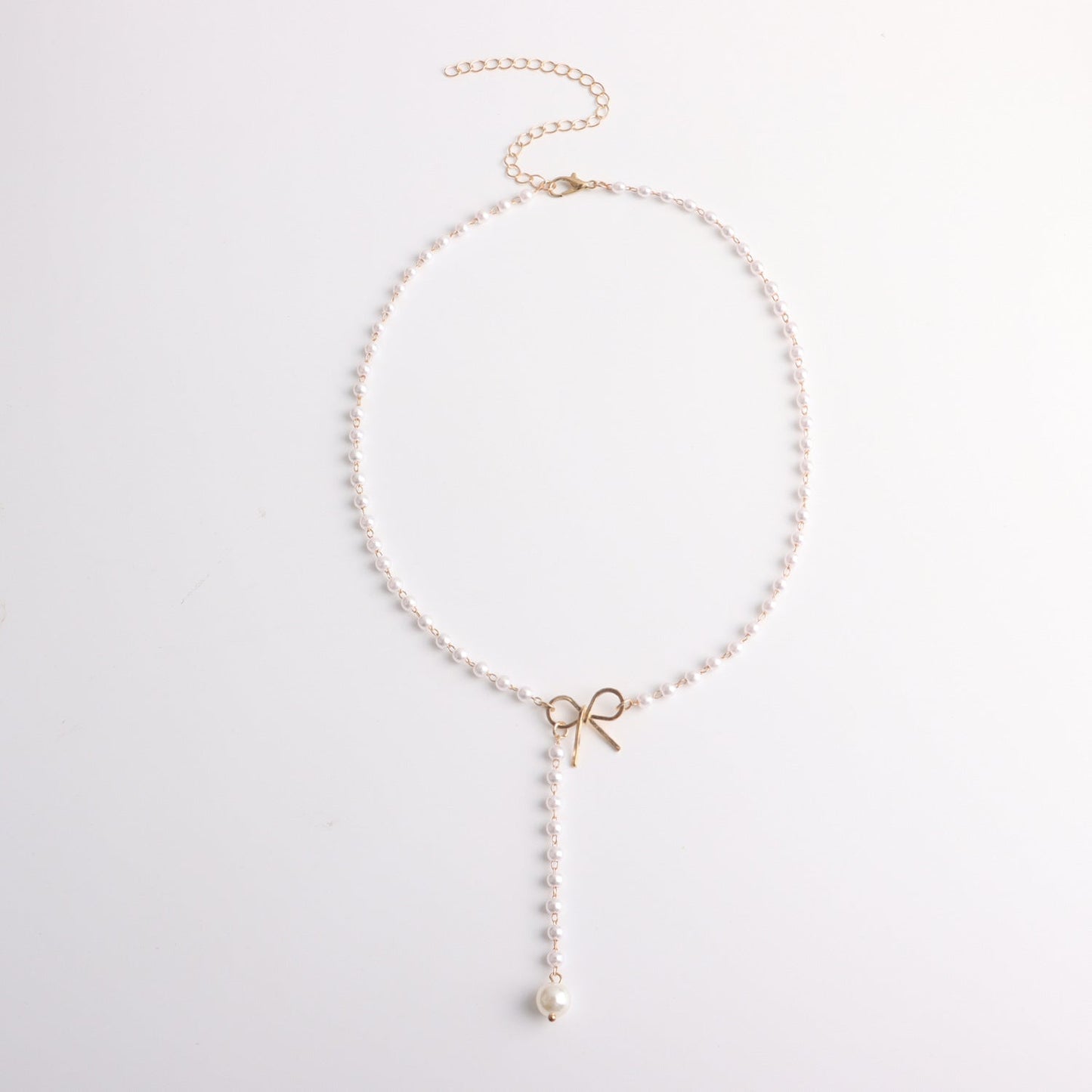 Alloy Bow Pearl Tassel Pendant Necklace