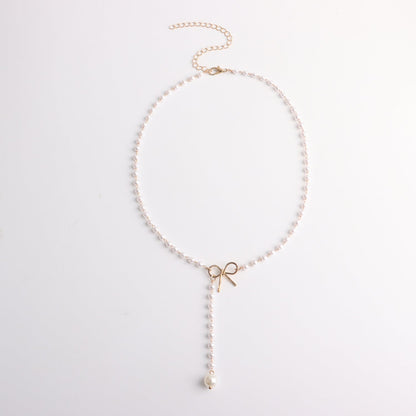 Alloy Bow Pearl Tassel Pendant Necklace